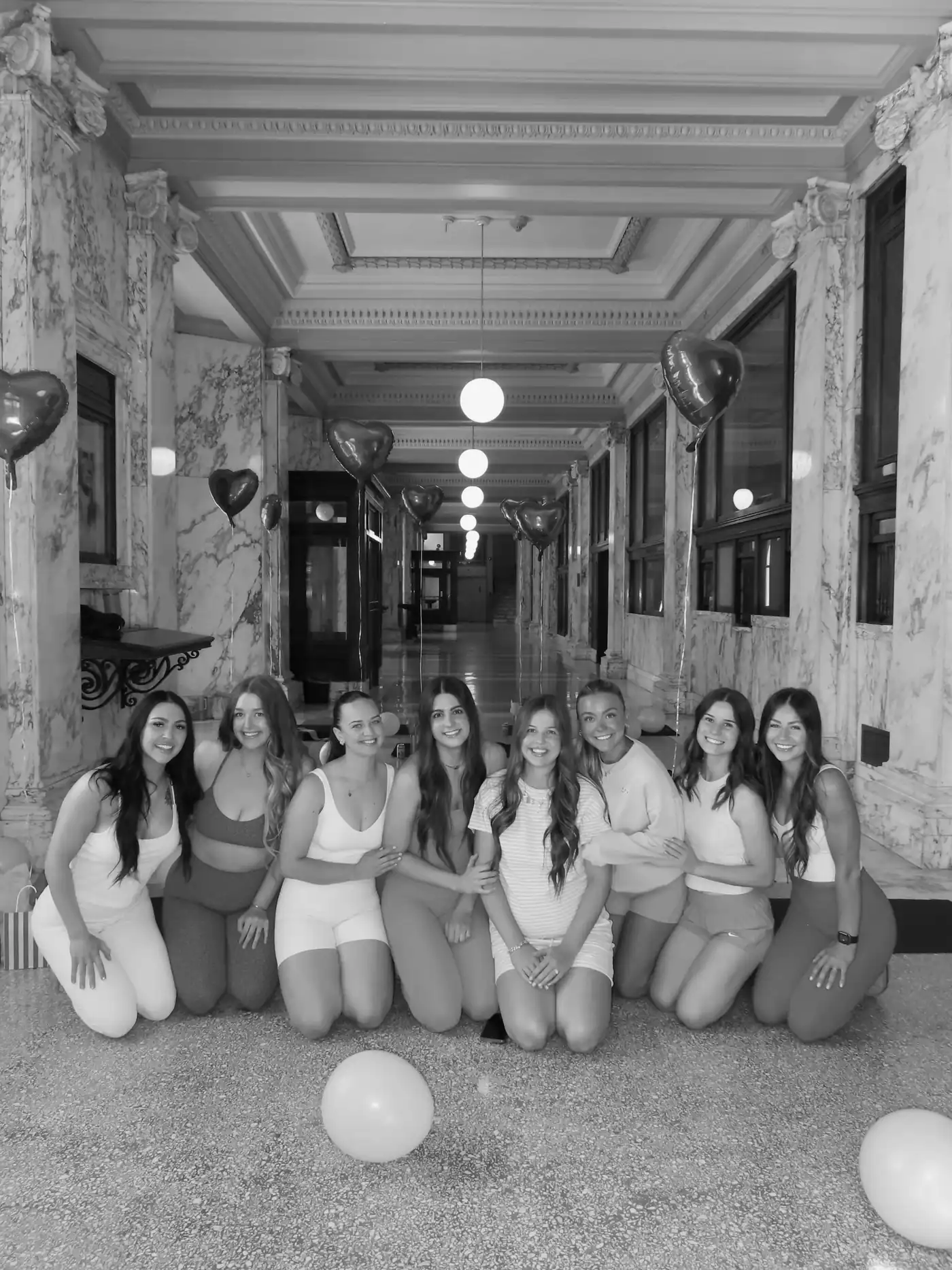 A private event class in a marble-walled venue