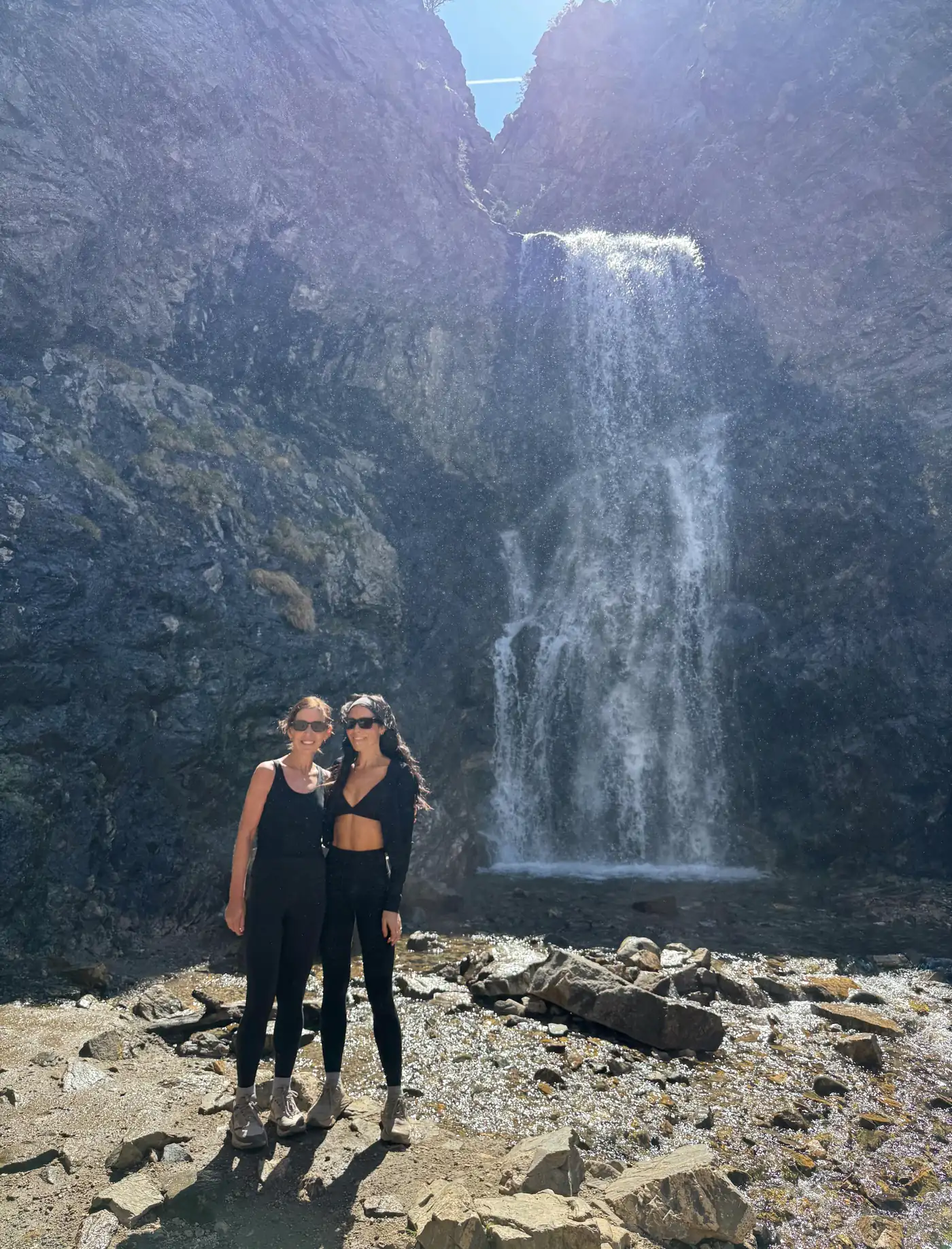 At the waterfall, one of the places she loves